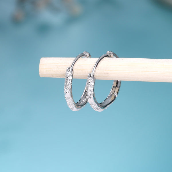 Bone Huggie Silver Earrings